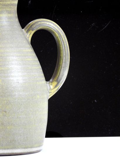 TAIZE
Large stoneware pitcher with green...