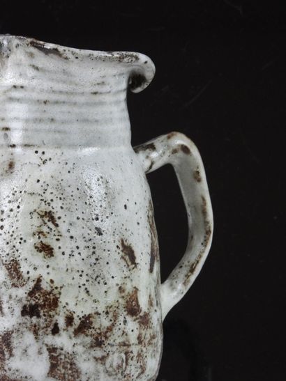 Eugène LION (1867-1945).
Stoneware pitcher...