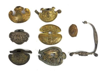 PIECES. Set of gilt or silver-plated brass...