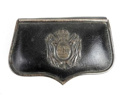EQUIPMENT. Black varnished leather-covered...