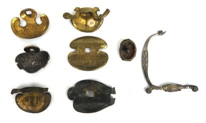 PIECES. Set of gilt or silver-plated brass...
