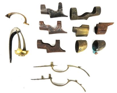 SPARE PARTS. Set of iron or brass rifle or...