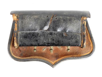 EQUIPMENT. Black varnished leather-covered...