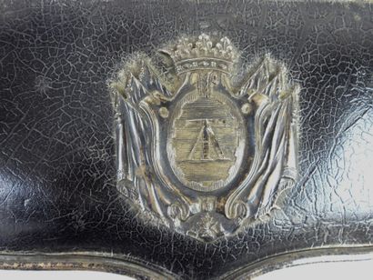 EQUIPMENT. Black varnished leather-covered...