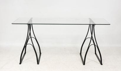 IKEA Vintage
Rectangular glass-top desk resting...