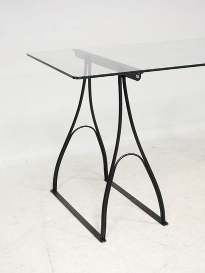 IKEA Vintage
Rectangular glass-top desk resting...
