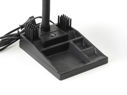 Piece from the 1980s
Black plastic desk lamp...