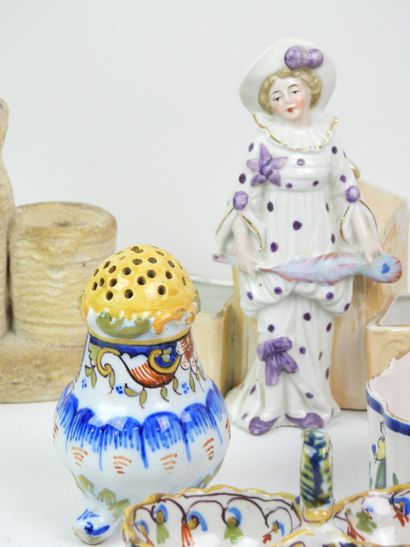 Eight earthenware and porcelain salt shakers...