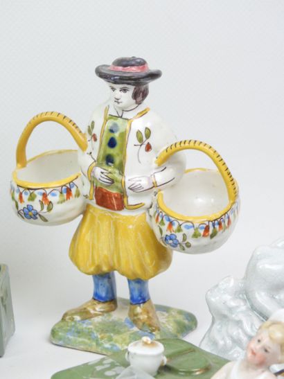 Eight earthenware and porcelain salt shakers...