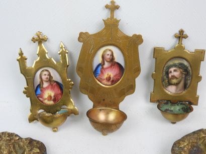 A collection of objects made of brass, silver...