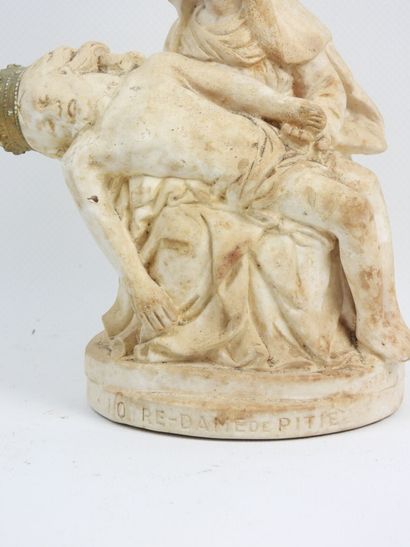 F. ROLLAND - Plaster sculpture depicting...