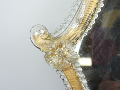 Venetian glass mirror with floral design....