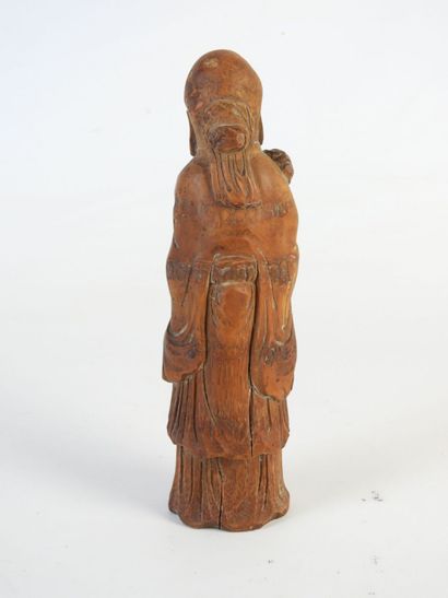 CHINE : Sage sculpté en bois. H. : 23 cm....