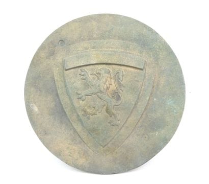 Plaque en bronze circulaire à décor d'un...