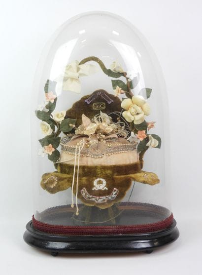 Bride figurine with a crown, displayed on...