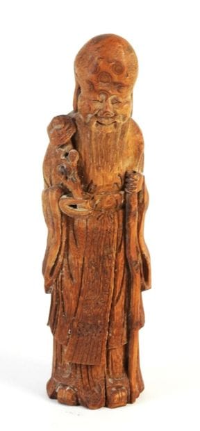 CHINE : Sage sculpté en bois. H. : 23 cm....