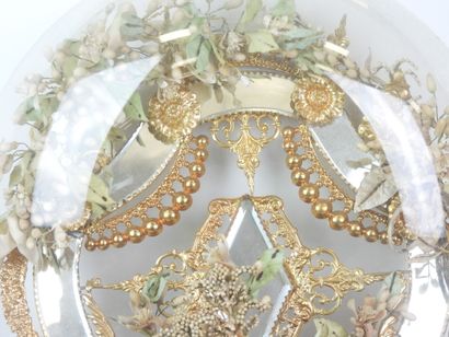 Bride figurine with a crown, mounted on a...