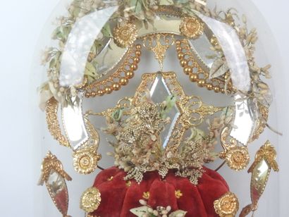 Bride figurine with a crown, mounted on a...