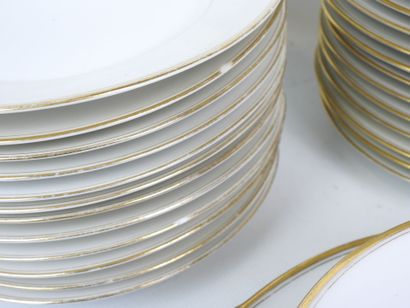 LIMOGES. Set of white porcelain tableware...