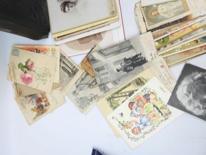A collection of religious images, small boxes,...