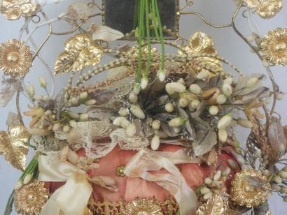 Bride figurine with a crown, mounted on a...
