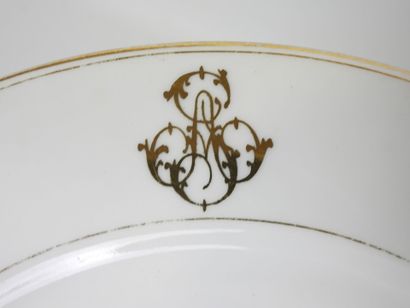 LIMOGES. Set of white porcelain tableware...