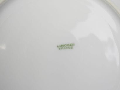 LIMOGES. Set of white porcelain tableware...