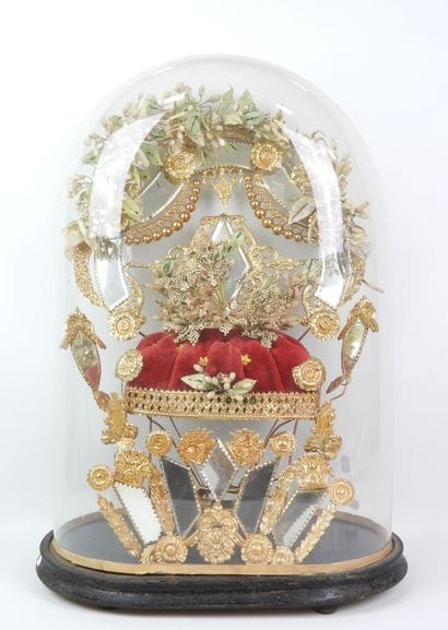 Bride figurine with a crown, mounted on a...