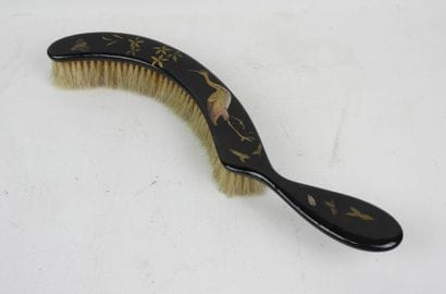 Black-lacquered wooden brush with Far Eastern...