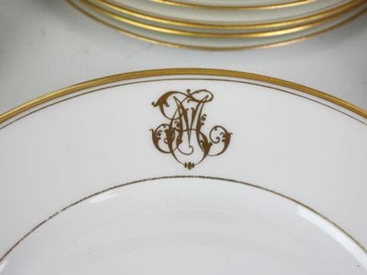 LIMOGES. Set of white porcelain tableware...