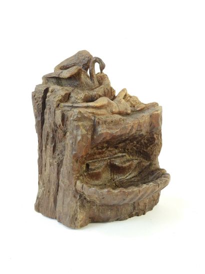 BENITIER en chêne à décor de Léda et d'un...
