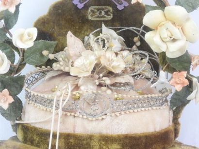 Bride figurine with a crown, displayed on...