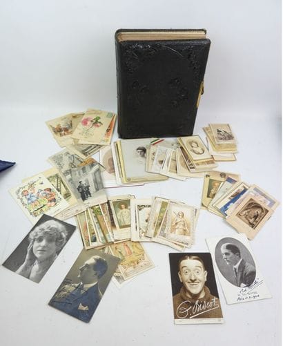 A collection of religious images, small boxes,...