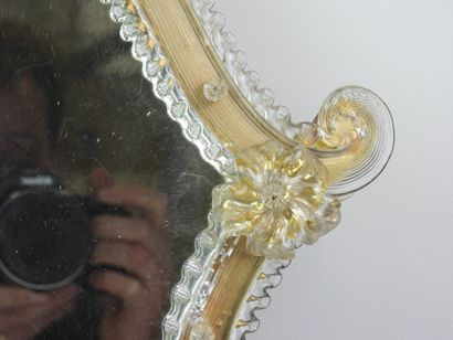 Venetian glass mirror with floral design....