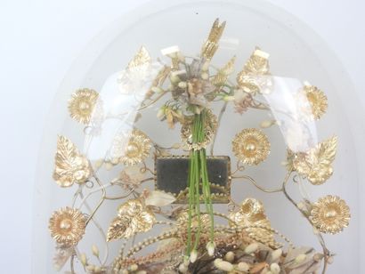 Bride figurine with a crown, mounted on a...