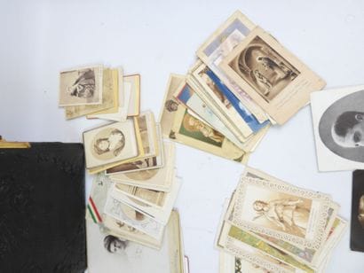 A collection of religious images, small boxes,...