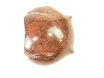 Hibou en métal à patine brune. H. : 9 cm...