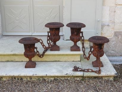 SET OF FOUR Medici vases made of cast iron...