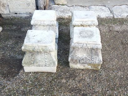FOUR RECONSTITUTED STONE CAPITAL BASES. 29...