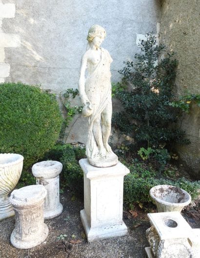 LARGE STATUE of a woman in the classical...