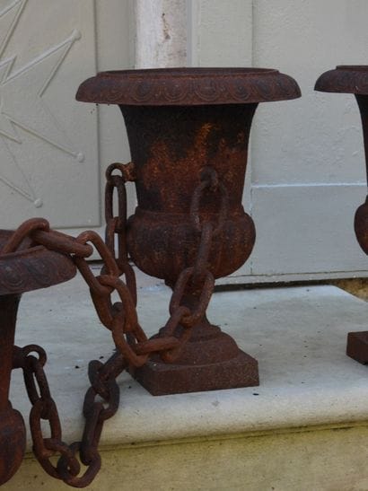 SET OF FOUR Medici vases made of cast iron...
