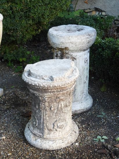 TWO pedestals made of reconstituted stone....