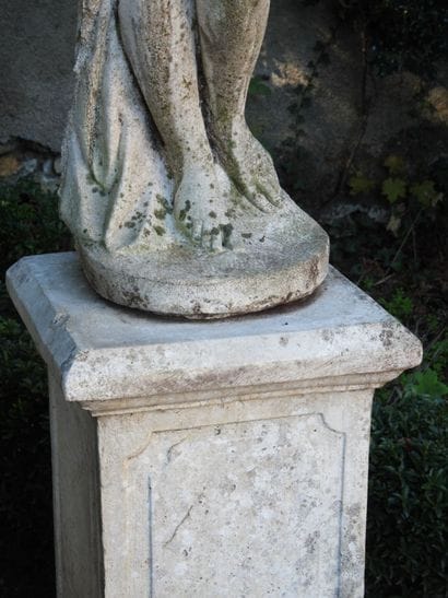LARGE STATUE of a woman in the classical...
