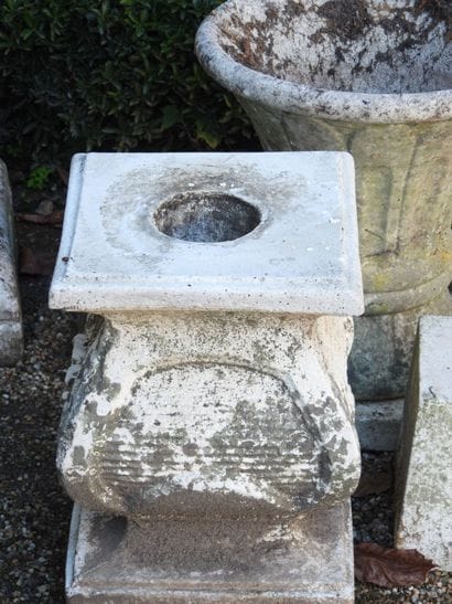 SET including a base, a conical vase, and...