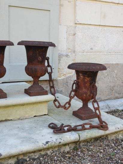 SET OF FOUR Medici vases made of cast iron...