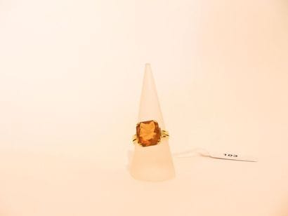 Ring in 18 karat yellow gold set with a citrine,...
