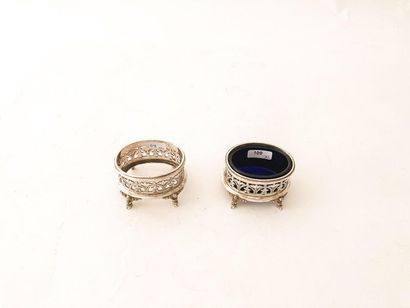 HALPHEN
Pair of oval quadripod salt shakers,...