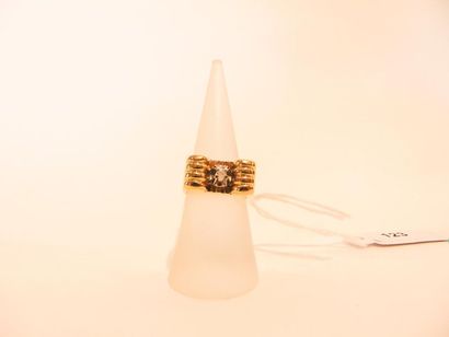 Art Deco ring in 18 karat yellow gold set...