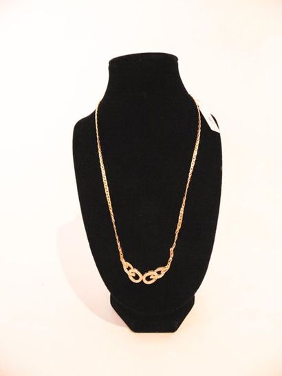 Necklace in 18 karat yellow gold set with...