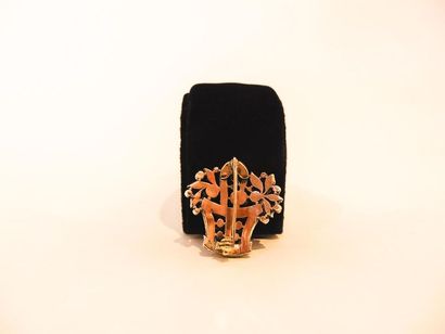 Brooch featuring a floral basket in yellow...